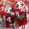 MADISON, WI - SEPTEMBER 26: O'Brien Schofield #50 of the Wisconsin Badgers celebrates with Chris Borland #44 against the Michigan State Spartans on September 26, 2009 at Camp Randall Stadium in Madison, Wisconsin. (Photo by Jonathan Daniel/Getty Images)