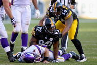 PITTSBURGH - OCTOBER 25: James Harrison #92 and LaMarr Woodley #56 of the Pittsburgh Steelers celebrate Harrison's sack on Brett Favre #4 of the Minnesota Vikings at Heinz Field on October 25, 2009 in Pittsburgh, Pennsylvania. Pittsburgh won 27-17. (Photo by Rick Stewart/Getty Images)