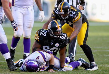 PITTSBURGH - OCTOBER 25: James Harrison #92 and LaMarr Woodley #56 of the Pittsburgh Steelers celebrate Harrison's sack on Brett Favre #4 of the Minnesota Vikings at Heinz Field on October 25, 2009 in Pittsburgh, Pennsylvania. Pittsburgh won 27-17. (Photo by Rick Stewart/Getty Images)
