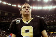 NEW ORLEANS - NOVEMBER 2:  Quarterback Drew Brees #9 of the New Orleans Saints leaves the field after leading his team to a 35-27 victory over the Atlanta Falcons in the game at the Louisiana Superdome on November 2, 2009 in New Orleans, Louisiana. (Photo by Chris Graythen/Getty Images)