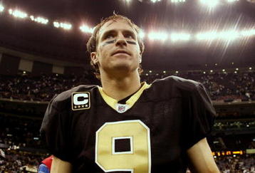 NEW ORLEANS - NOVEMBER 2:  Quarterback Drew Brees #9 of the New Orleans Saints leaves the field after leading his team to a 35-27 victory over the Atlanta Falcons in the game at the Louisiana Superdome on November 2, 2009 in New Orleans, Louisiana. (Photo by Chris Graythen/Getty Images)