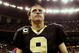 NEW ORLEANS - NOVEMBER 2:  Quarterback Drew Brees #9 of the New Orleans Saints leaves the field after leading his team to a 35-27 victory over the Atlanta Falcons in the game at the Louisiana Superdome on November 2, 2009 in New Orleans, Louisiana. (Photo by Chris Graythen/Getty Images)