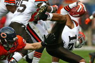 CHICAGO - NOVEMBER 01: Joshua Cribbs #16 of the Cleveland Browns is upended by Craig Steltz #20 of the Chicago Bears at Soldier Field on November 1, 2009 in Chicago, Illinois. The Bears defeated the Browns 30-6. (Photo by Jonathan Daniel/Getty Images)