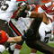 CHICAGO - NOVEMBER 01: Joshua Cribbs #16 of the Cleveland Browns is upended by Craig Steltz #20 of the Chicago Bears at Soldier Field on November 1, 2009 in Chicago, Illinois. The Bears defeated the Browns 30-6. (Photo by Jonathan Daniel/Getty Images)