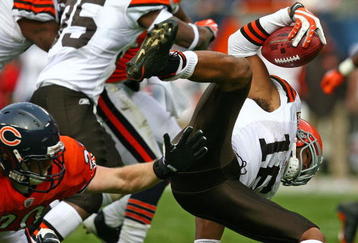 CHICAGO - NOVEMBER 01: Joshua Cribbs #16 of the Cleveland Browns is upended by Craig Steltz #20 of the Chicago Bears at Soldier Field on November 1, 2009 in Chicago, Illinois. The Bears defeated the Browns 30-6. (Photo by Jonathan Daniel/Getty Images)