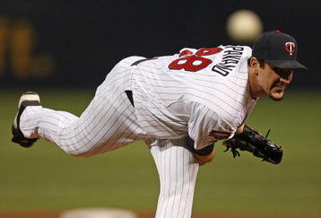 MINNEAPOLIS - OCTOBER 11: Carl Pavano #48 of the Minnesota Twins delivers the ball against the New York Yankees in Game Three of the ALDS during the 2009 MLB Playoffs at the Hubert H. Humphrey Metrodome on October 11, 2009 in Minneapolis, Minnesota. (Photo by Jonathan Daniel/Getty Images)