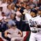 ST PETERSBURG, FL - OCTOBER 03:  Akinori Iwamura #1 of the Tampa Bay Rays celebrates with Jason Bartlett #8 after Iwamura's two run home run in the fifth inning against the Chicago White Sox in Game 2 of the American Leaugue Divisional Series at Tropicana Field on October 3, 2008 in St. Petersburg, Florida.  (Photo by Doug Benc/Getty Images)