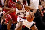 PORTLAND, OR - OCTOBER 27:  Kyle Lowry #7 of the Houston Rockets guards Andre Miller #24 of the Portland Trail Blazers during the season opener on October 27, 2009 at the Rose Garden in Portland, Oregon. NOTE TO USER: User expressly acknowledges and agrees that, by downloading and or using this Photograph, user is consenting to the terms and conditions of the Getty Images License Agreement.  (Photo by Jonathan Ferrey/Getty Images)