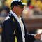 ANN ARBOR, MI - SEPTEMBER 19:  Head coach Rich Rodriguez of the Michigan Wolverines watches warmups before the game with the Eastern Michigan Eagles at Michigan Stadium on September 19, 2009 in Ann Arbor, Michigan.  Michigan won 45-17.  (Photo by Stephen Dunn/Getty Images)