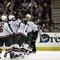 PITTSBURGH, PA - OCTOBER 31:  Eric Belanger #25 of the Minnesota Wild celebrates his goal with teammates in the first period against the Pittsburgh Penguins at Mellon Arena on October 31, 2009 in Pittsburgh, Pennsylvania.  (Photo by Justin K. Aller/Getty Images)