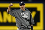 NEW YORK - NOVEMBER 03:  Derek Jeter #2 of the New York Yankees warms up during World Series workouts on November 3, 2009 at Yankee Stadium in the Bronx borough of New York City.  (Photo by Jared Wickerham/Getty Images)