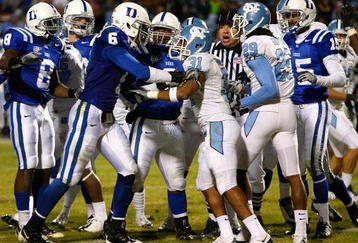 DURHAM, NC - NOVEMBER 29:  Marcus Jones #6 of the Duke Blue Devils gets into a scuffle with Trimane Goddard #31 of the North Carolina Tar Heels during the game at Wallace Wade Stadium on November 29, 2008 in Durham, North Carolina.  (Photo by Kevin C. Cox/Getty Images)