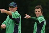 BELFAST, UNITED KINGDOM - JUNE 24:  Trent Johnstone (L) and Kyle McCallan of Ireland make an adjustment to the field during the One Day International match between Ireland and South Africa at the Civil Service Cricket Club in Stormont on June 24, 2007 in Belfast, Northern Ireland.  (Photo by Hamish Blair/Getty Images)