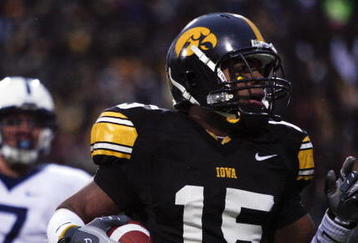 IOWA CITY, IA - NOVEMBER 8: Wide receiver Derrell Johnson-Koulianos #15 of the Iowa Hawkeyes scores a touchdown in the third quarter of play as Anthony Scirrotto #7 of the Penn State Nittany Lions defends on the play at Kinnick Stadium on November 8, 2008 in Iowa City, Iowa. Iowa defeated Penn State 24-23. (Photo by David K Purdy/Getty Images)