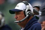 EAST RUTHERFORD, NJ - NOVEMBER 01:  Head coach Rex Ryan of the New York Jets watches as his team loses to the Miami Dolphins at Giants Stadium on November 1, 2009 in East Rutherford, New Jersey. The Dolphins defeated the Jets 30-25.  (Photo by Chris Trotman/Getty Images)