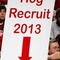 DALLAS, TEXAS - MARCH 17:  A young Arkansas Razorbacks fan holds a sign up during the game against Bucknell Bison in the First Round of the 2006 NCAA Division 1 Men's Basketball Championship Tournament on March 17, 2006 at the American Airlines Center in Dallas, Texas.  (Photo by Ronald Martinez/Getty Images)