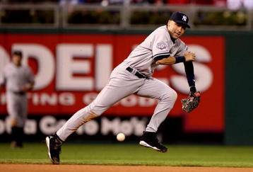 PHILADELPHIA - NOVEMBER 02:  Derek Jeter #2 of the New York Yankees can't make a play on a single hit by Carlos Ruiz #51 of the Philadelphia Phillies in the bottom of the eighth inning  Game Five of the 2009 MLB World Series at Citizens Bank Park on November 2, 2009 in Philadelphia, Pennsylvania.  (Photo by Jed Jacobsohn/Getty Images)