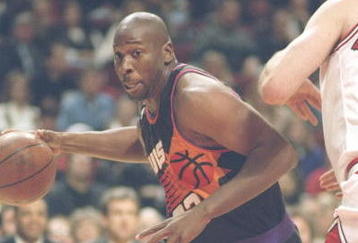 30 Nov 1994:  Center Wayman Tisdale of the Phoenix Suns drives to the basket during a game against the Chicago Bulls at the United Center in Chicago, Illinois.  The Bulls won the game 93-82. Mandatory Credit: Jonathan Daniel  /Allsport