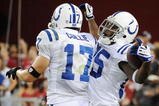 GLENDALE, AZ - SEPTEMBER 27: Wide receiver Pierre Garcon #85 of the Indianapolis Colts reacts with teammate Austin Collie #17 after Garcon makes a 53-yard touchdown catch against the Arizona Cardinals in the second quarter during the game at University of Phoenix Stadium on September 27, 2009 in Glendale, Arizona.  (Photo by Harry How/Getty Images)