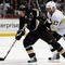 ANAHEIM, CA - NOVEMBER 03:  Teemu Selanne #8 of the Anaheim Ducks is pursued by Michael Rupp #17 of the Pittsburgh Penguins in the third period at the Honda Center on November 3, 2009 in Anaheim, California. The Penguins defeated the Ducks 4-3.  (Photo by Jeff Gross/Getty Images)