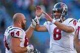 ORCHARD PARK, NY - NOVEMBER 01: Matt Schaub #8 and Kasey Studdard #64  of the Houston Texans celebrate after a touchdown run by Ryan Moats #21 (not shown) against the Buffalo Bills at Ralph Wilson Stadium on November 1, 2009 in Orchard Park, New York. Houston won 31-10. (Photo by Rick Stewart/Getty Images)