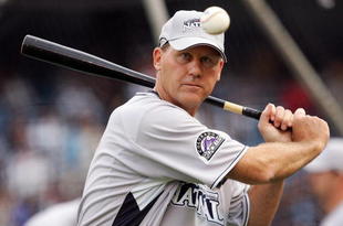 NEW YORK - JULY 14: Jamie Quirk of the Colorado Rockies warms up his team during batting practice for the 2008 MLB All-Star game at Yankee Stadium on July 14, 2008 in the Bronx borough of New York City.  (Photo by Jim McIsaac/Getty Images)