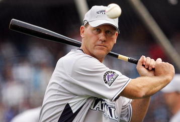 NEW YORK - JULY 14: Jamie Quirk of the Colorado Rockies warms up his team during batting practice for the 2008 MLB All-Star game at Yankee Stadium on July 14, 2008 in the Bronx borough of New York City.  (Photo by Jim McIsaac/Getty Images)