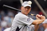 NEW YORK - JULY 14: Jamie Quirk of the Colorado Rockies warms up his team during batting practice for the 2008 MLB All-Star game at Yankee Stadium on July 14, 2008 in the Bronx borough of New York City.  (Photo by Jim McIsaac/Getty Images)