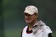 PALM HARBOR, FL - MARCH 06: Head coach Jon Gruden of the Tampa Bay Buccaneers caddies for John Daly during the first round of the PODS Championship at Innisbrook Resort and Golf Club on March 6, 2008 in Tarpon Springs, Florida. (Photo by Sam Greenwood/Getty Images)