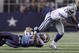 ARLINGTON, TX - AUGUST 21: Wide receiver Roy Williams #11 of the Dallas Cowboys carries the ball in the first quarter against corner back Cortland Finnegan #31of the Tennessee Titans during a preseason game at Cowboys Stadium on August 21, 2009 in Arlington, Texas. (Photo by Tom Pennington/Getty Images)