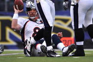 BALTIMORE - NOVEMBER 1:  Jarrett Johnson #95 of the Baltimore Ravens sacks Kyle Orton #8 of the Denver Broncos at M&T Bank Stadium on November 1, 2009 in Baltimore, Maryland. The Ravens defeated the Broncos 30-7. (Photo by Larry French/Getty Images)