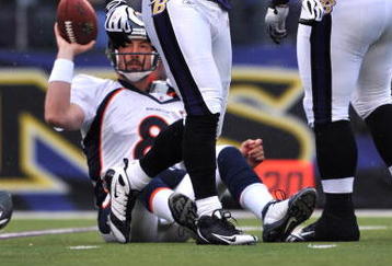 BALTIMORE - NOVEMBER 1:  Jarrett Johnson #95 of the Baltimore Ravens sacks Kyle Orton #8 of the Denver Broncos at M&T Bank Stadium on November 1, 2009 in Baltimore, Maryland. The Ravens defeated the Broncos 30-7. (Photo by Larry French/Getty Images)
