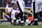 BALTIMORE - NOVEMBER 1:  Jarrett Johnson #95 of the Baltimore Ravens sacks Kyle Orton #8 of the Denver Broncos at M&T Bank Stadium on November 1, 2009 in Baltimore, Maryland. The Ravens defeated the Broncos 30-7. (Photo by Larry French/Getty Images)