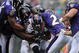 BALTIMORE - NOVEMBER 1: Brandon Marshall #15 of the Denver Broncos is tackled by the Baltimore Ravens defense at M&T Bank Stadium on November 1, 2009 in Baltimore, Maryland. The Ravens defeated the Broncos 30-7. (Photo by Larry French/Getty Images)