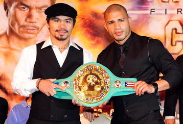 BEVERLY HILLS, CA - SEPTEMBER 14:  Manny Pacquiao and  Miguel Cotto pose for pictures during the press conference at the Beverly Hills Hotel on September 14, 2009 in Beverly Hills, California.  (Photo by Jacob de Golish/Getty Images)