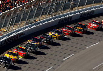 TALLADEGA, AL - NOVEMBER 01:  Casey Mears, driver of the #07 Jack Daniel's Chevrolet, leads a single file draft during the NASCAR Sprint Cup Series AMP Energy 500 at Talladega Superspeedway on November 1, 2009 in Talladega, Alabama.  (Photo by Chris Graythen/Getty Images)