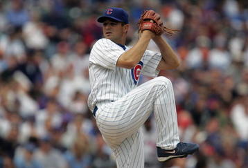 CHICAGO - APRIL 22:  Ted Lilly #30 of the Chicago Cubs pitches against the New York Mets on April 22, 2008 at Wrigley Field in Chicago, Illinois. (Photo by Jonathan Daniel/Getty Images) 