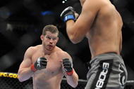 PORTLAND, OR - AUGUST 29:  UFC fighter Nate Marquardt (L) battles UFC fighter Demian Maia (R) during their Middleweight bout at UFC 102:  Couture vs. Nogueira at the Rose Garden Arena on August 29, 2009 in Portland, Oregon.  (Photo by Jon Kopaloff/Getty Images)