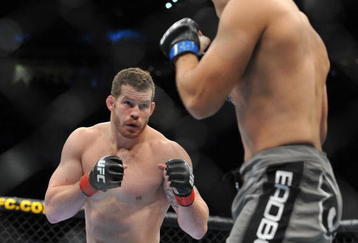 PORTLAND, OR - AUGUST 29:  UFC fighter Nate Marquardt (L) battles UFC fighter Demian Maia (R) during their Middleweight bout at UFC 102:  Couture vs. Nogueira at the Rose Garden Arena on August 29, 2009 in Portland, Oregon.  (Photo by Jon Kopaloff/Getty Images)