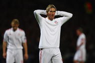 LYON, FRANCE - NOVEMBER 04:  Fernando Torres holds his head after a missed chance during the UEFA Champions League Group E match between Lyon and Liverpool at the Stade de Gerland on November 4, 2009 in Lyon, France.  (Photo by Michael Steele/Getty Images)