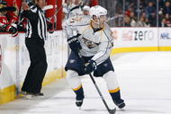 OTTAWA, ON - OCTOBER 22:  J.P Dumont #71 of the Nashville Predators handles the puck against the Ottawa Senators during a game at Scotiabank Place on October 22, 2009 in Ottawa, Canada.  (Photo by Phillip MacCallum/Getty Images)