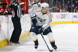 OTTAWA, ON - OCTOBER 22:  J.P Dumont #71 of the Nashville Predators handles the puck against the Ottawa Senators during a game at Scotiabank Place on October 22, 2009 in Ottawa, Canada.  (Photo by Phillip MacCallum/Getty Images)