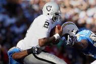 SAN DIEGO, CA - NOVEMBER 1:   Quarterback JaMarcus Russell #2 of the Oakland Raiders is sacked by Steve Gregory #28 of the San DIego Chargers in the 2nd half on November 1, 2009 at Qualcomm Stadium in San Diego, California. (Photo By Donald Miralle/Getty Images)