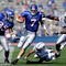 LAWRENCE, KS - SEPTEMBER 19:  Quarterback Kale Pick #7 of the Kansas Jayhawks carries the ball upfield  during the game against the Duke Blue Devils on Kivisto Field at Memorial Stadium on September 19, 2009 in Lawrence, Kansas.  (Photo by Jamie Squire/Getty Images)