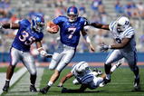 LAWRENCE, KS - SEPTEMBER 19:  Quarterback Kale Pick #7 of the Kansas Jayhawks carries the ball upfield  during the game against the Duke Blue Devils on Kivisto Field at Memorial Stadium on September 19, 2009 in Lawrence, Kansas.  (Photo by Jamie Squire/Getty Images)