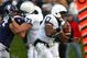 EVANSTON, IL - OCTOBER 31: Daryll Clark #17 of the Penn State Nittany Lions runs with the ball as teammate Dennis Landolt #73 blocks Vince Browne #94 of the Northwestern Wildcats at Ryan Field on October 31, 2009 in Evanston, Illinois. Penn State defeated Northwestern 34-13. (Photo by Jonathan Daniel/Getty Images)