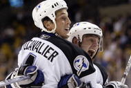 BOSTON - NOVEMBER 30: Vincent Lecavalier #4 of the Tampa Bay Lightning and Vaclav Prospal #20 celebrate Lecavalier's goal in the third period against the Boston Bruins on November 30, 2006 at the TD Banknorth Garden in Boston, Massachusetts. The Bruins defeated the Lightning 4-3 in an overtime shootout. (Photo by Elsa/Getty Images)