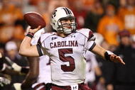 KNOXVILLE, TN - OCTOBER 31:  Stephen Garcia #5 of the South Carolina Gamecocks drops back to throw the ball against the Tennessee Volunteers at Neyland Stadium on October 31, 2009 in Knoxville, Tennessee.  (Photo by Streeter Lecka/Getty Images)