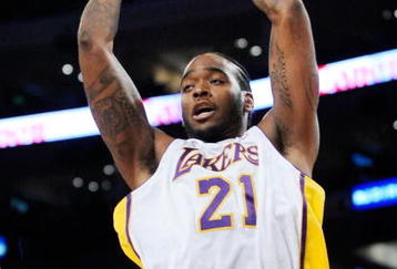 LOS ANGELES, CA - NOVEMBER 01:  Josh Powell #21 of the Los Angeles Lakers drives against the Atlanta Hawks during the NBA basketball game at Staples Center on November 1, 2009 in Los Angeles, California. NOTE TO USER: User expressly acknowledges and agrees that, by downloading and/or using this Photograph, user is consenting to the terms and conditions of the Getty Images License Agreement.  (Photo by Kevork Djansezian/Getty Images)