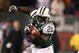 EAST RUTHERFORD, NJ - OCTOBER 18:  Thomas Jones #20 of The New York Jets runs with the ball against The Buffalo Bills defends during their game on October 18, 2009 at Giants Stadium in East Rutherford, New Jersey.  (Photo by Al Bello/Getty Images)